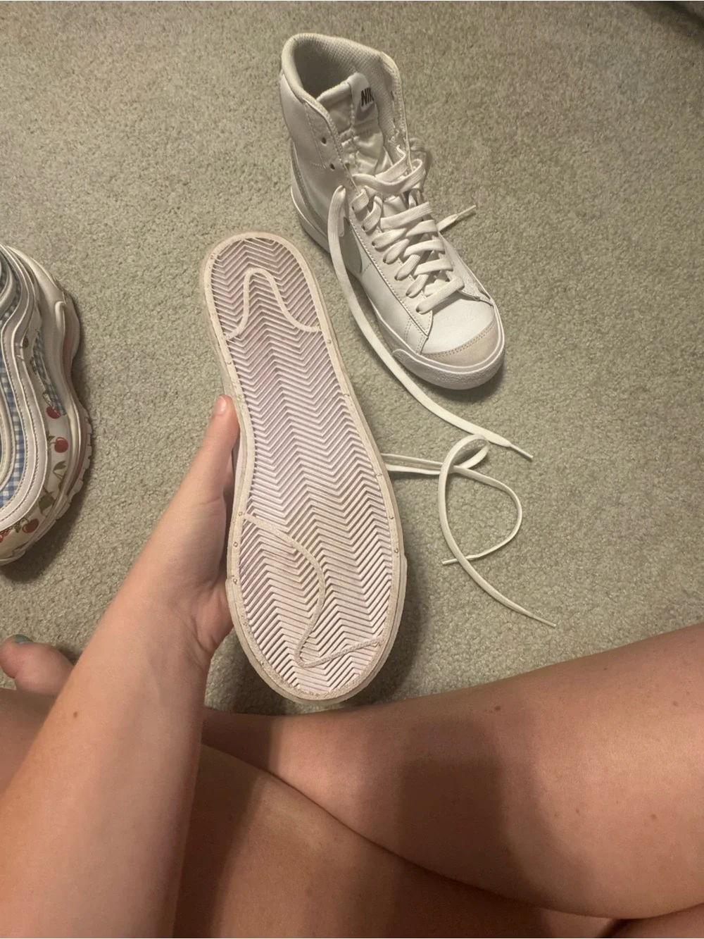 Nike White High-Top Sneakers with silver Accents